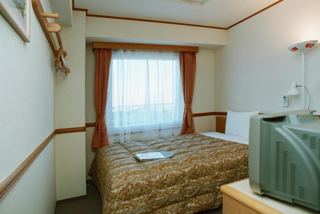Toyoko Inn Saitama Shintoshin Zimmer foto