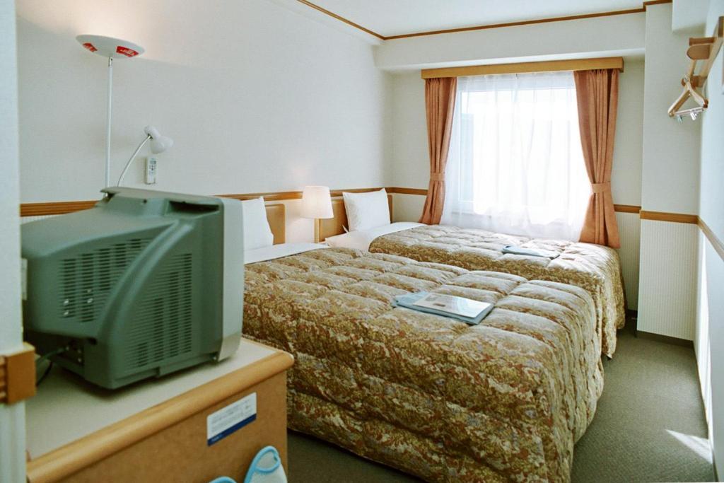 Toyoko Inn Saitama Shintoshin Zimmer foto